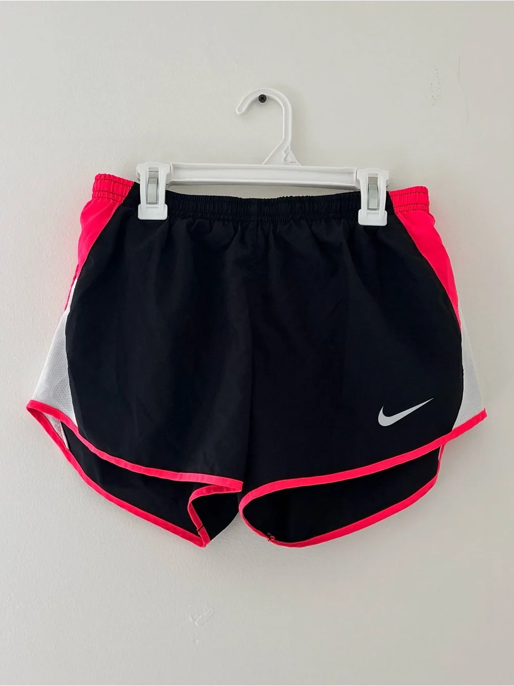 Nike Dri-Fit black shorts with pink/white side panels